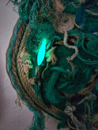 Glow-in-the-dark squid lure ,  - beach, ocean, sea, coast, na pali, napali, cliffs, coast, mountains artwork by Emily Miller